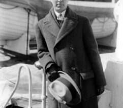 A black-and-white photograph of Norman Rockwell