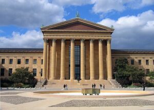 A large building with a classical-style columned portico