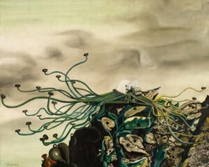 Two anthropomorphic typewriters intertwined atop a rugged rock formation.