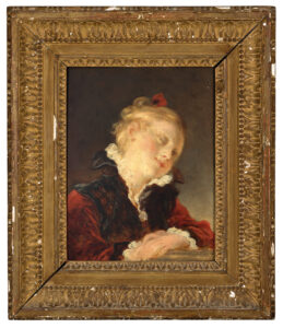 A small portrait of a blonde girl.