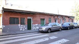 A single-story brick building in Madrid