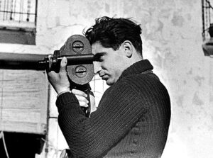 A photo of a man using a hand-held camera