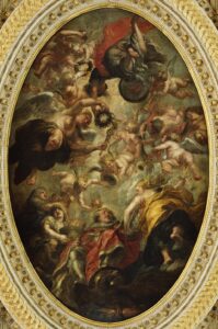 A large oval painting of a king rising into heaven surrounded by angels and female allegorical figures.