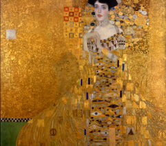 A portrait of a woman decorated with sequins and gold leaf.