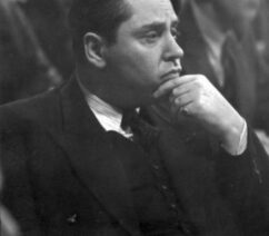 A black-and-white picture of a man in profile