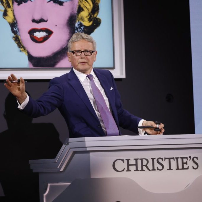 A photo of Christie's global president Jussi Pylkkänen at the rostrum during the Thomas and Doris Ammann collection