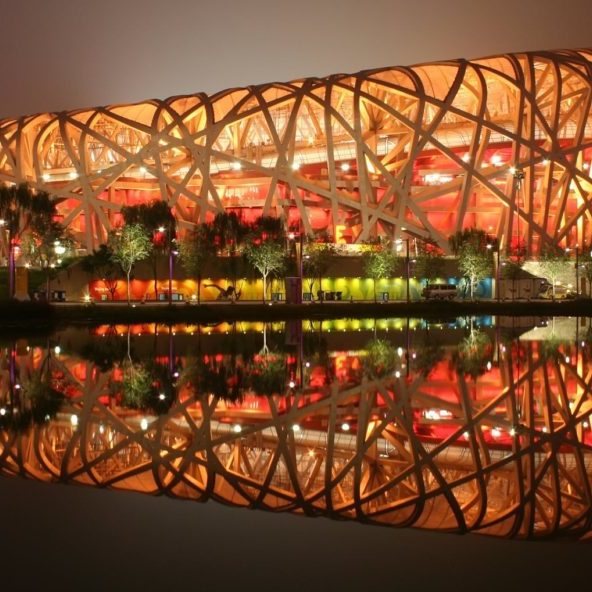An evening image of the stadium with all its lights on