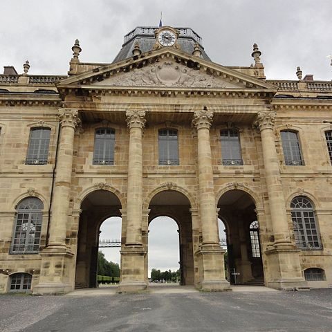 The facade of a large French chateau.