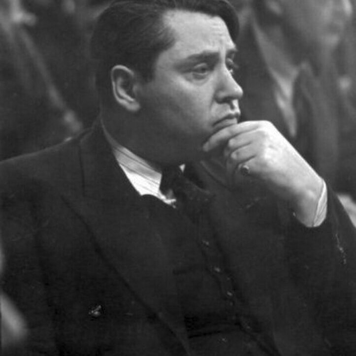 A black-and-white picture of a man in profile