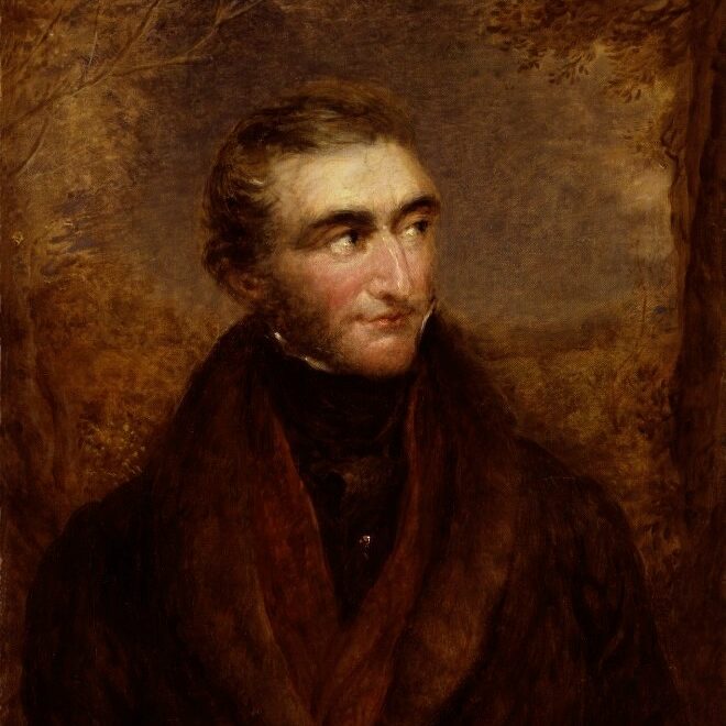 A portrait of J.M.W. Turner, showing him with short hair and prominent sideburns. He wears a red shirt, brown coat, and sits surrounded by forrest motifs in shades of brown.