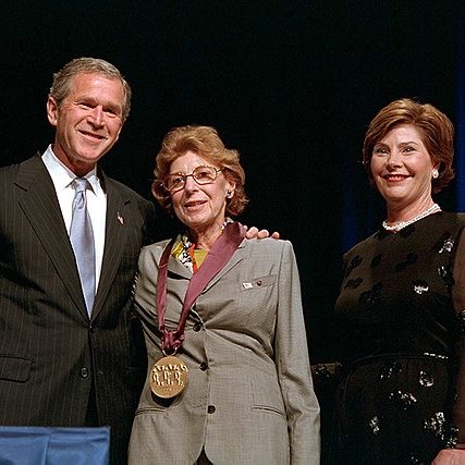 The artist Helen Frankenthaler receiving the National Medal of Arts, standing with President George W. Bush and First Lady Laura Bush.