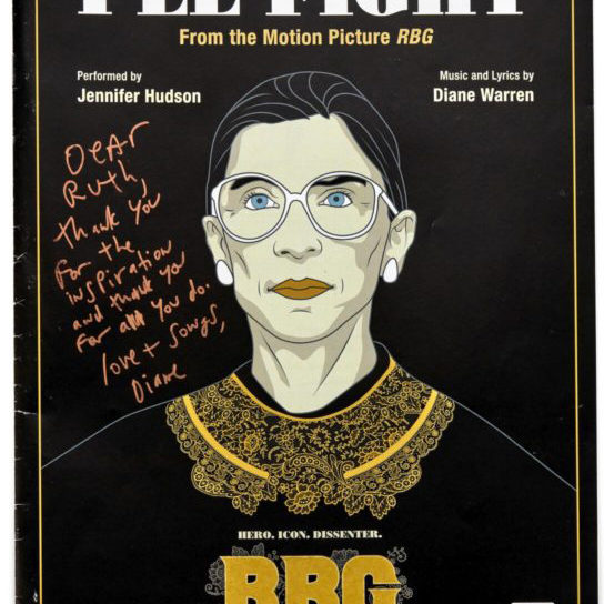 photo of Ruth Bader Ginsburg on sheet music for I'll Fight from the movie RBG