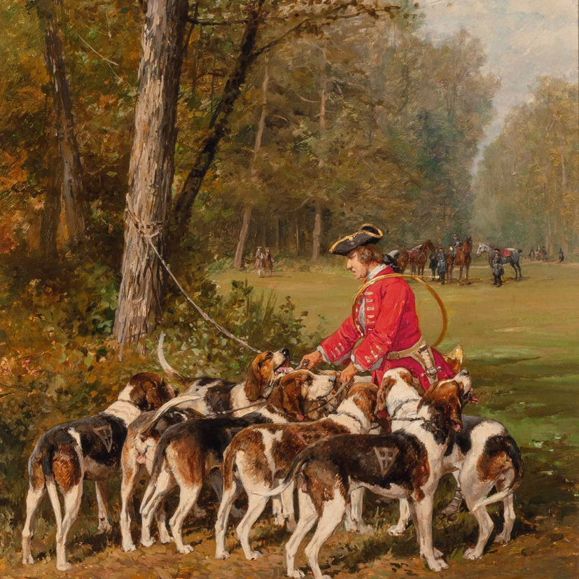A hunter with dogs in a landscape