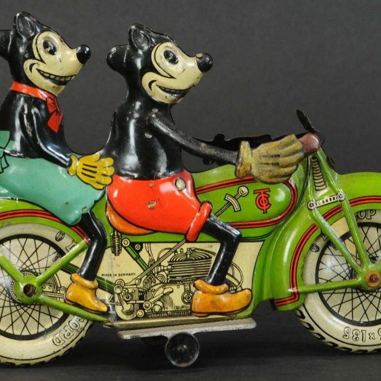 colorful toy motorcyle with mickey and minnie mouse