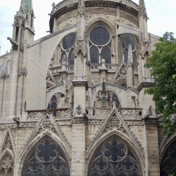 A view of the exterior of Notre Dame in Paris from the east side.