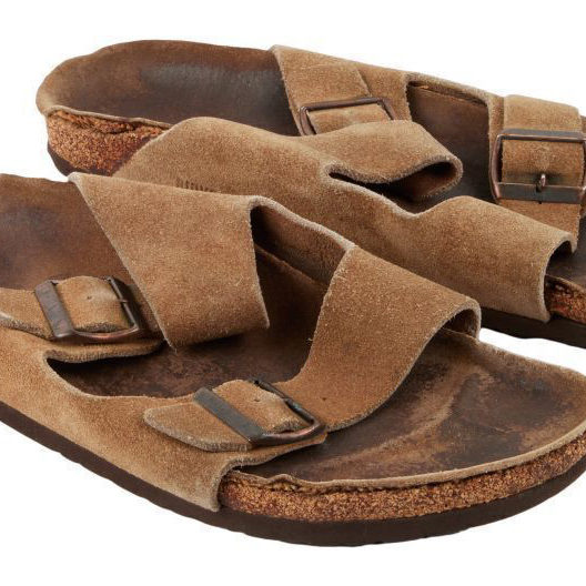 pair of brown birkenstock sandals