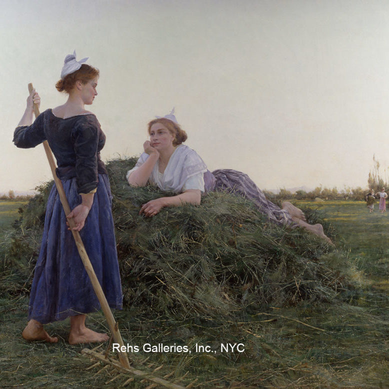 Two woman in a wheat field, one laying on a stack of wheat
