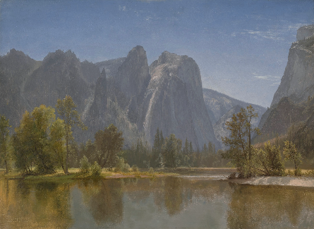 A lake with trees and mountains in the background by Bierstadt.