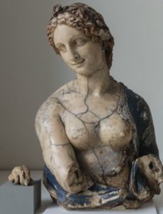 A statue of a personDescription automatically generated with medium confidence